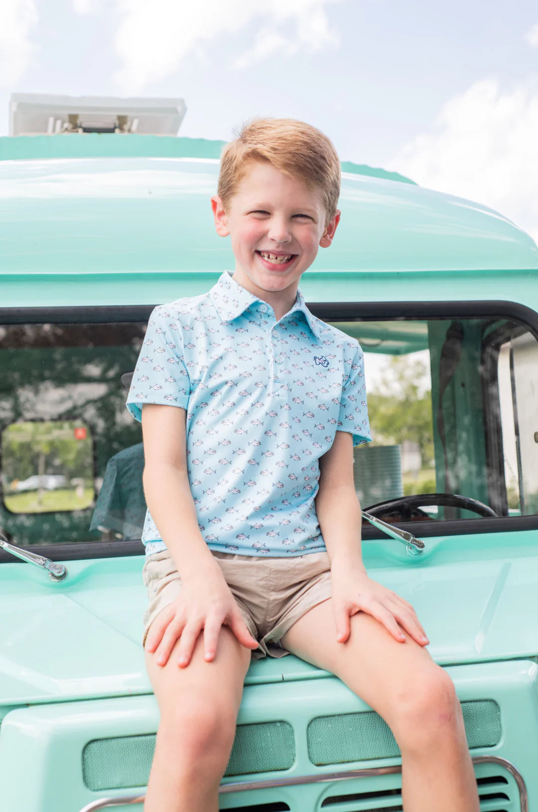 Boys performance polo pompano fish