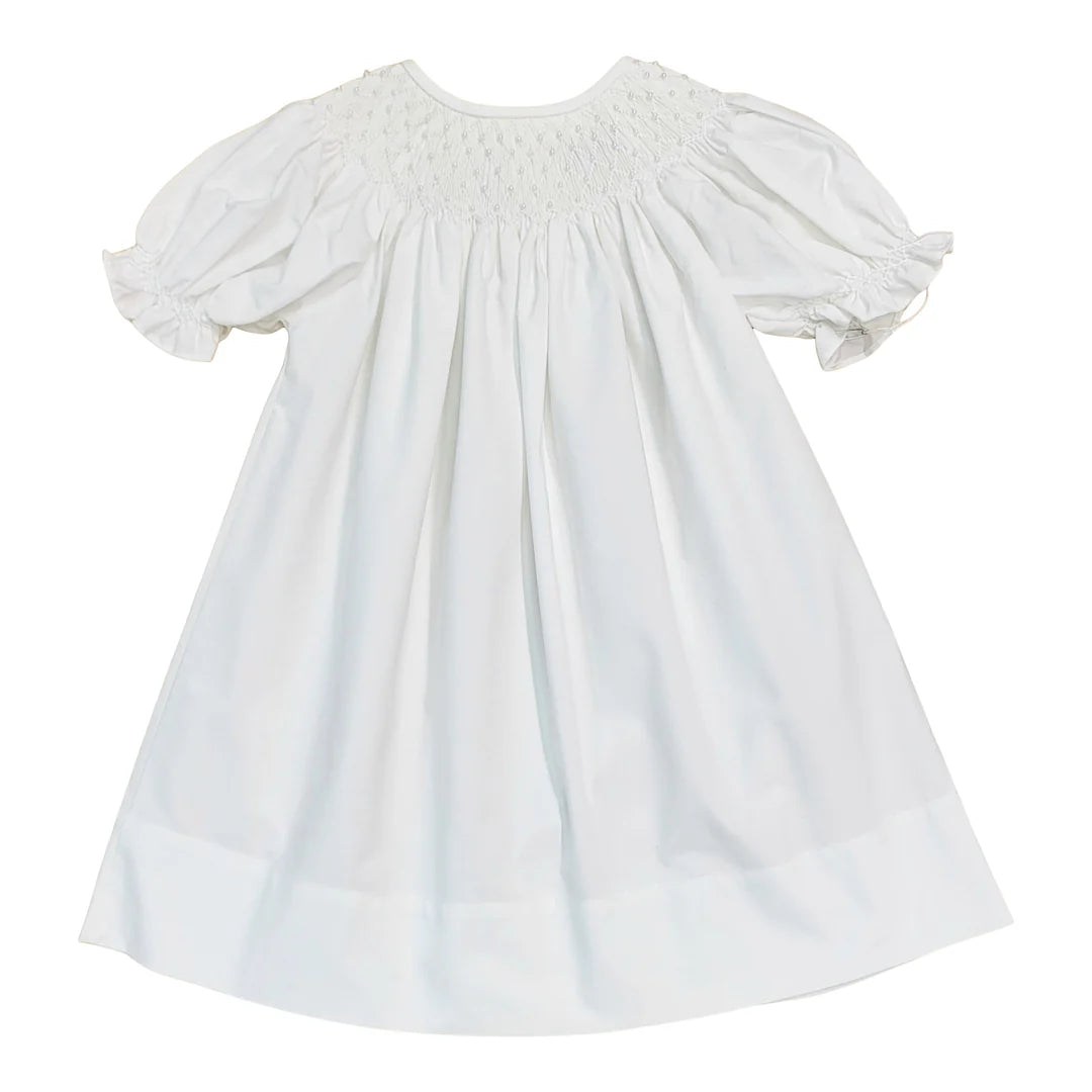 White smocked pearl dress